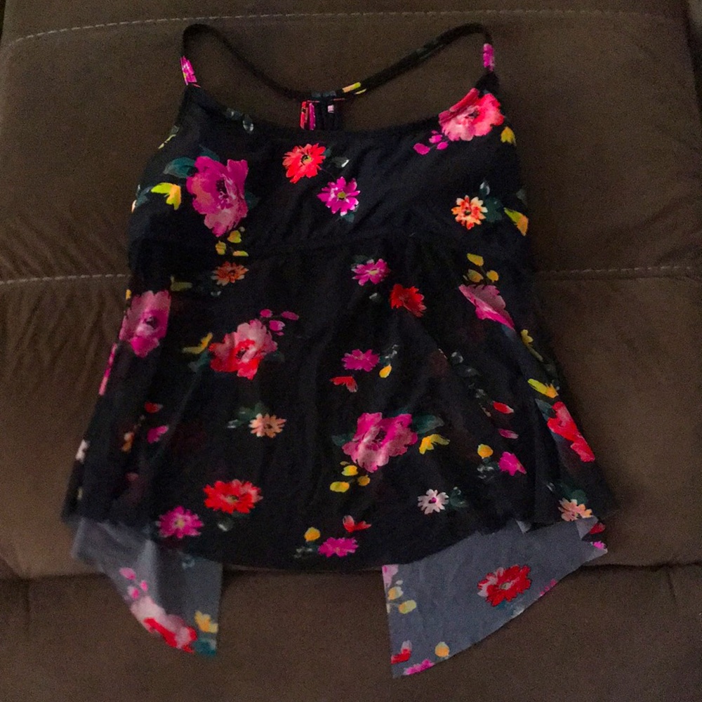 Black bathing suit top with flower.